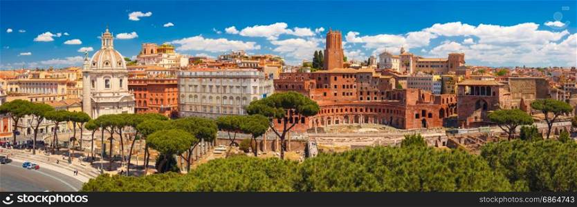 Panoramma of ancient Trajan Forum, Rome, Italy. Panoramic view with ancient ruins of Trajan Forum, Market, Trajan Column and church Most Holy Name of Mary in sunny day, Rome, Italy