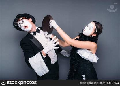 Pantomime theater performers with frying pan. Mime actors comedy performing