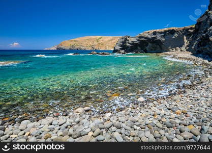 Papafragas beach with crystal clear turquoise water and tunnel rock formations in Milos island, Greece. Papafragas beach in Milos island, Greece