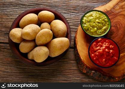 Papas arrugas al mojo Canary islands wrinkled potatoes with green and red sauces