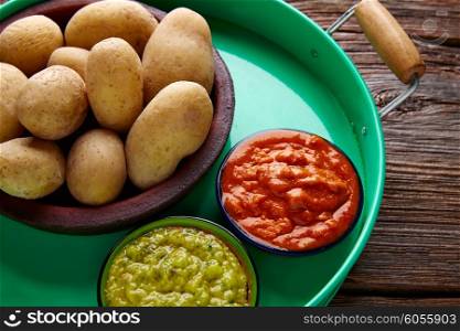 Papas arrugas al mojo Canary islands wrinkled potatoes with green and red sauces
