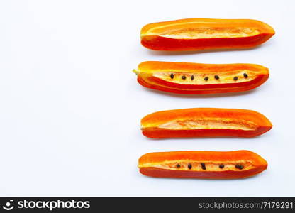 Papaya fruit on white background. Copy space