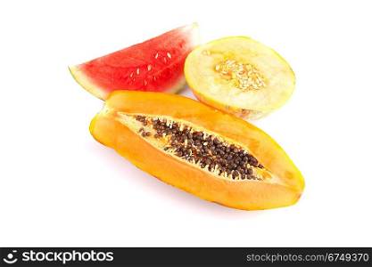 Papaya, melon and watermelon slices isolated over white