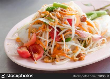 Papaya Spicy Salad on White Dish