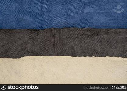 paper abstract in colors of Estonia national flag - blue, black and white, set of textured, handmade paper sheets