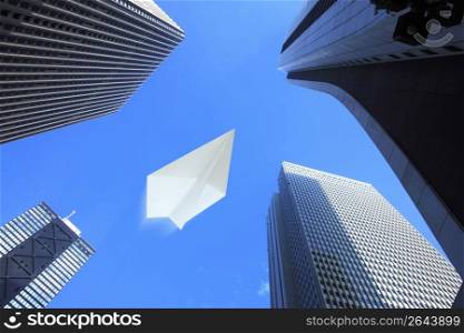 Paper airplane and Skyscraper