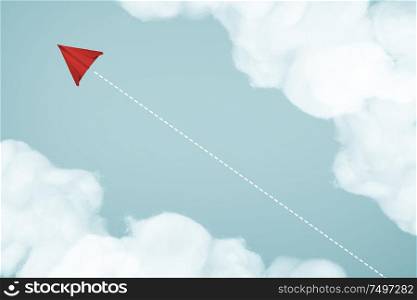Paper airplane flying on blue sky and cloud . Business leadership concept .