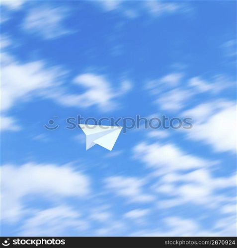 Paper airplane on a sky background