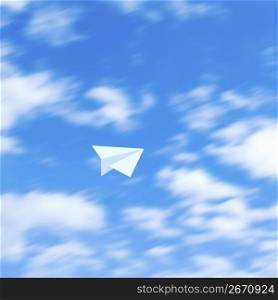 Paper airplane on a sky background