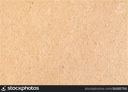 paper background - textured surface of old brown cardboard close up