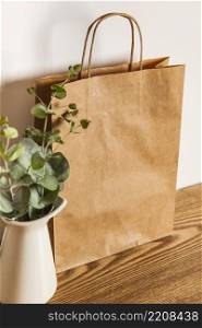 paper bag plant wooden surface