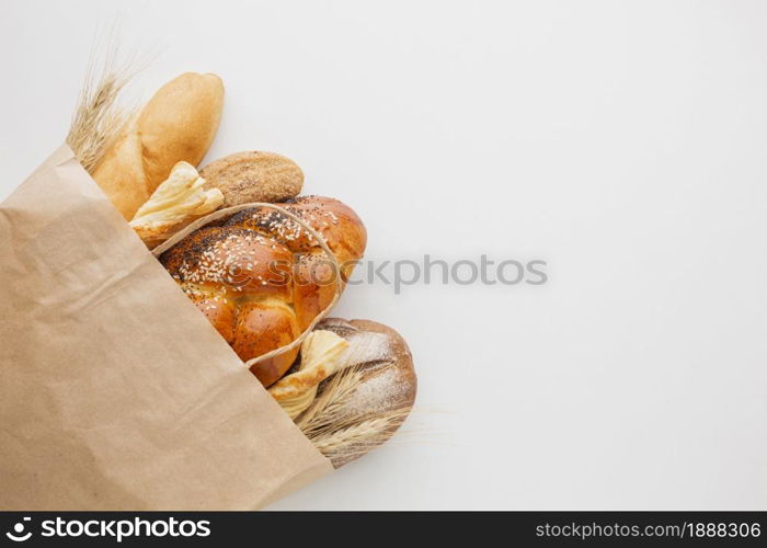 paper bag with variety bread . Resolution and high quality beautiful photo. paper bag with variety bread . High quality and resolution beautiful photo concept