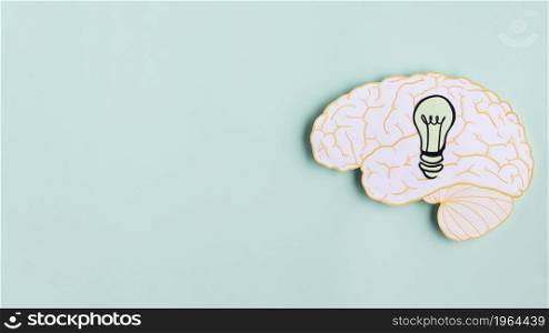 paper brain with light bulb copy space. High resolution photo. paper brain with light bulb copy space. High quality photo