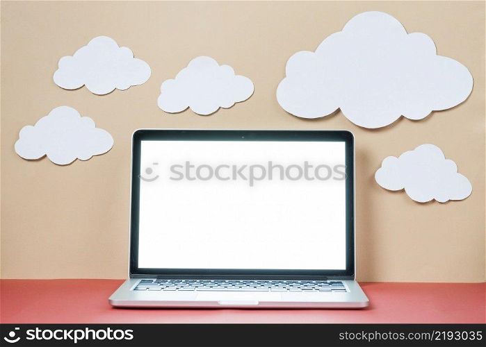 paper clouds laptop