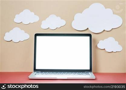 paper clouds laptop