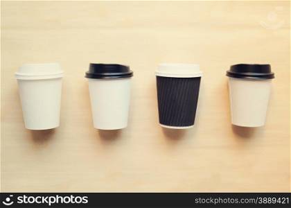Paper coffee cup mock up for identity branding with retro filter effect