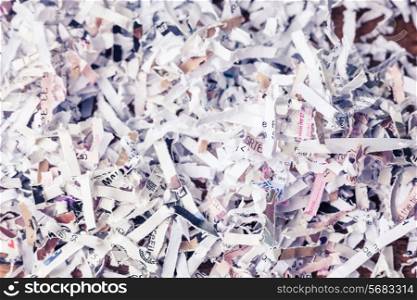 Paper cut into tiny pieces by cross shredder