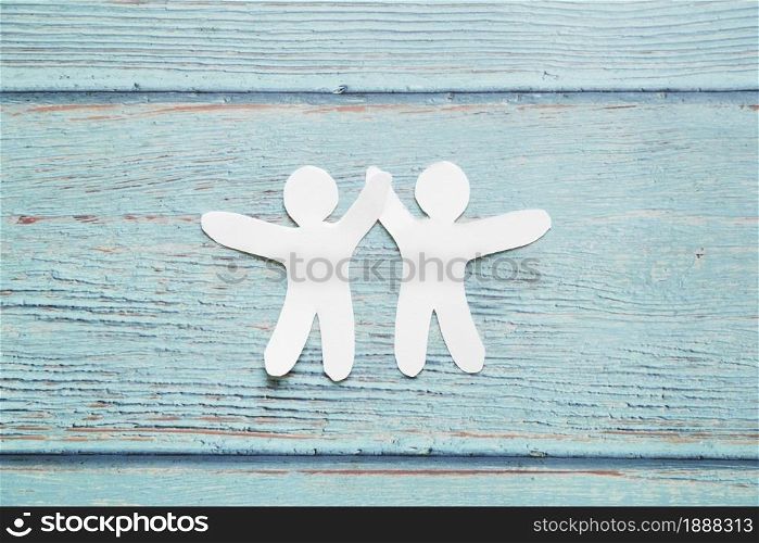 paper cut people on blue background . Resolution and high quality beautiful photo. paper cut people on blue background . High quality and resolution beautiful photo concept