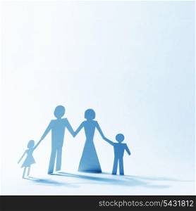 Paper family linked together over light background