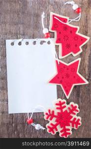 paper for note and christmas background on a table