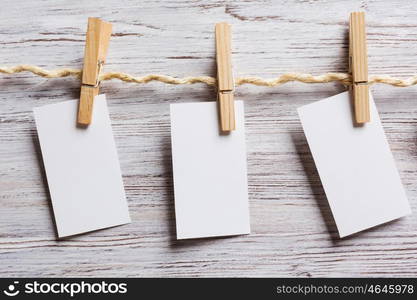 Paper hang on clothesline. Sheets of old paper hang on clothesline. Place your text