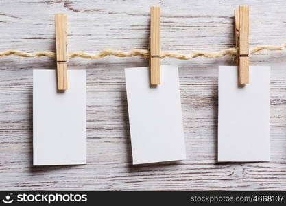 Paper hang on clothesline. Sheets of old paper hang on clothesline. Place your text