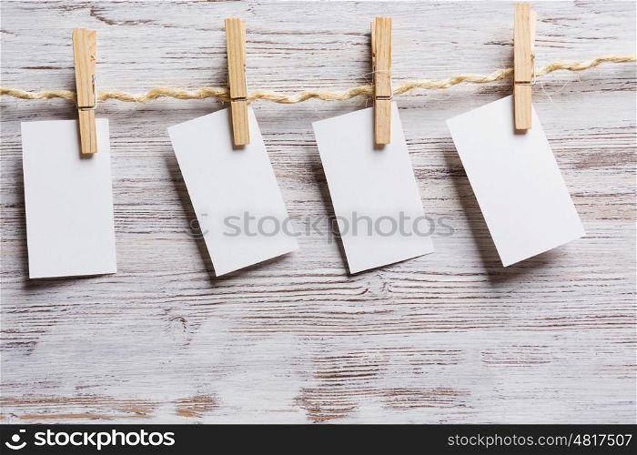 Paper hang on clothesline. Sheets of old paper hang on clothesline. Place your text