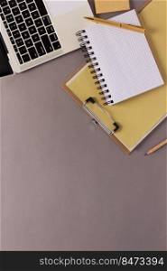 Paper notebook and stationary supplies at table background texture. Office business concept idea