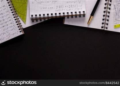 Paper notebook or notepad at black background texture. Creative idea concept