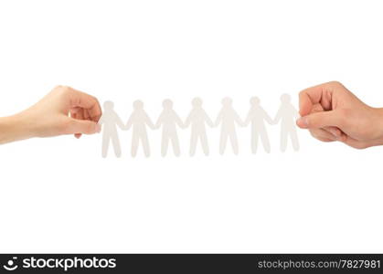 paper people in hands isolated on a white background