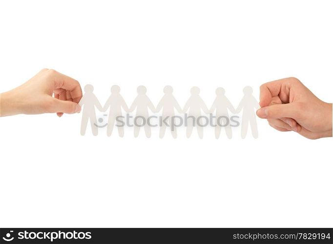 paper people in hands isolated on a white background