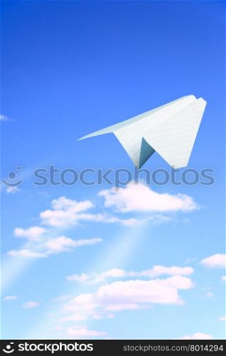 Paper plane flying. Sky and clouds in the background