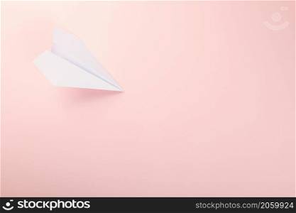 Paper plane letter document message. Top view mock up design of airplane travel, isolated on pink background with blank empty space for copy space