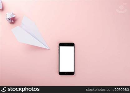Paper plane letter document message. Top view mock up design of airplane travel and mobile phone, education or innovation origami plane with smartphone blank screen, isolated on pink background
