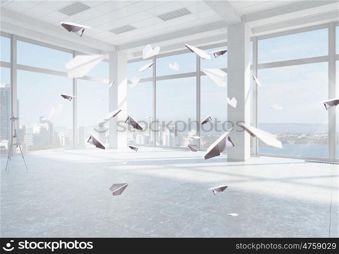 Paper planes in office. White empty interior with flying paper planes