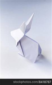 Paper rabbit origami isolated on a blank white background.. Paper rabbit origami isolated on a white background