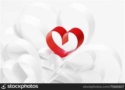Paper ribbon hearts on white background, Valentines day concept. Paper hearts