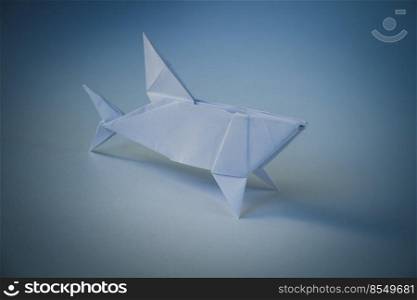 Paper shark origami isolated on a blank background. Paper shark origami isolated on blank background