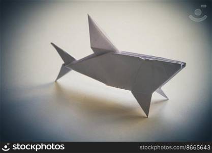 Paper shark origami isolated on a blank background. Paper shark origami isolated on blank background