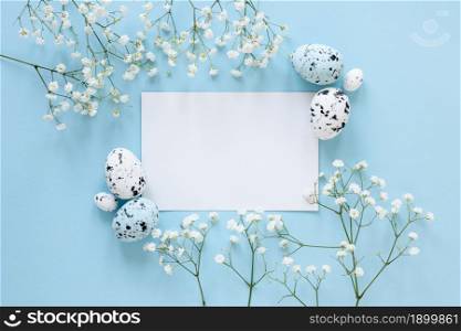 paper sheet table beside painted eggs flowers. Resolution and high quality beautiful photo. paper sheet table beside painted eggs flowers. High quality beautiful photo concept