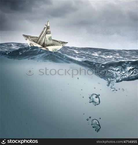 Paper ship. Paper ship floating on water on stormy waves