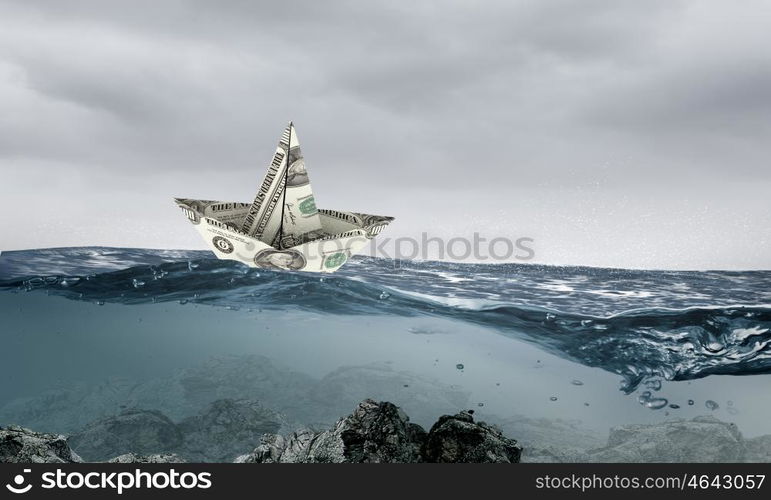 Paper ship. Paper ship floating on water on waves