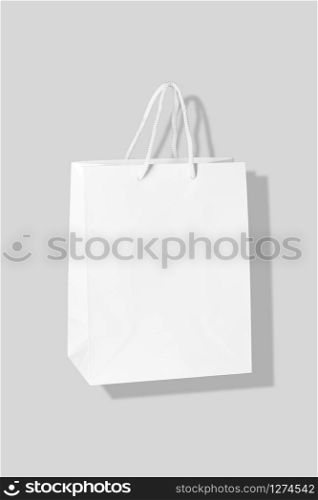 Paper shopping bag isolated on Gray background. Mock up template