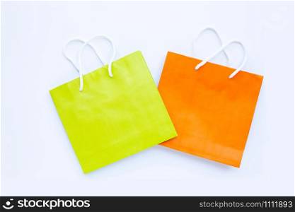 Paper shopping bags on white background. Top view