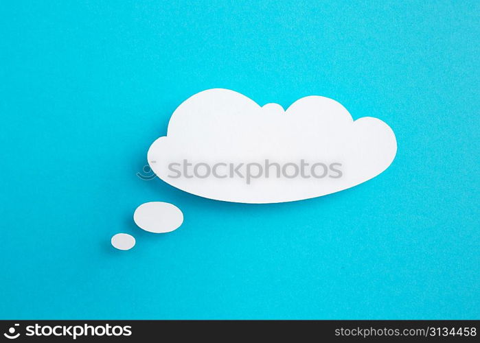 paper speech bubble on blue background