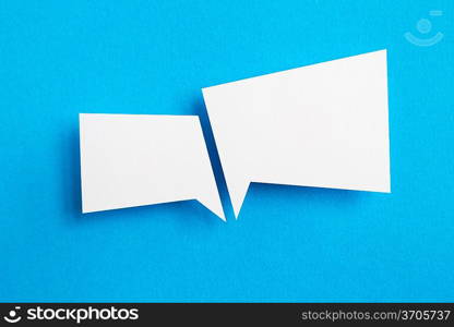 paper speech bubble on blue background