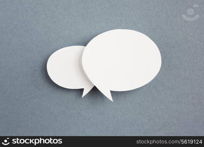 paper speech bubble on grey background