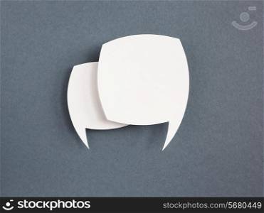paper speech bubble on grey background