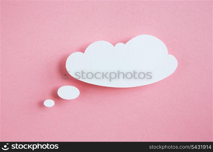 paper speech bubble on pink background