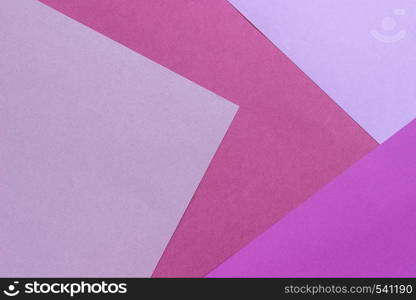 Paper texture background, abstract geometric pattern of pink purple violet colors for design.. Paper texture background, abstract geometric pattern of pink purple violet colors for design